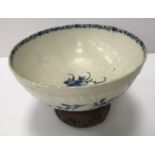 An 18th Century Worcester blue and white and relief decorated floral spray painted bowl,