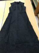 A quantity of ladies clothing to include a Susan Small evening dress and coat in black silk type