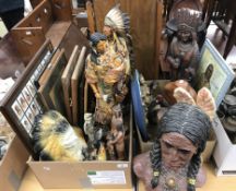 Two boxes containing various Native American ornamental figures, paintings, pictures,