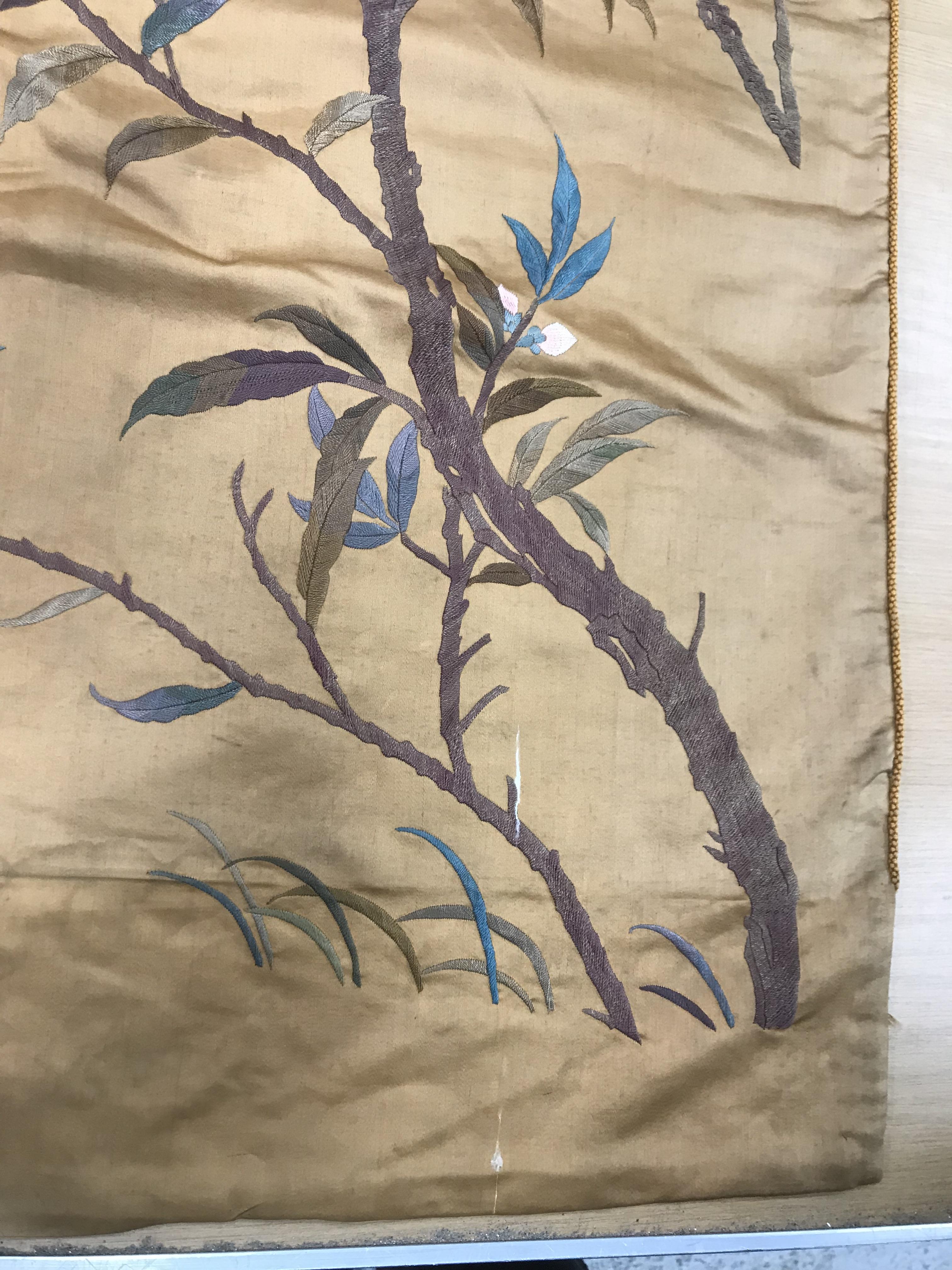 An early 20th Century silk panel set with embroidered floral decoration and Chinese character marks, - Image 7 of 8