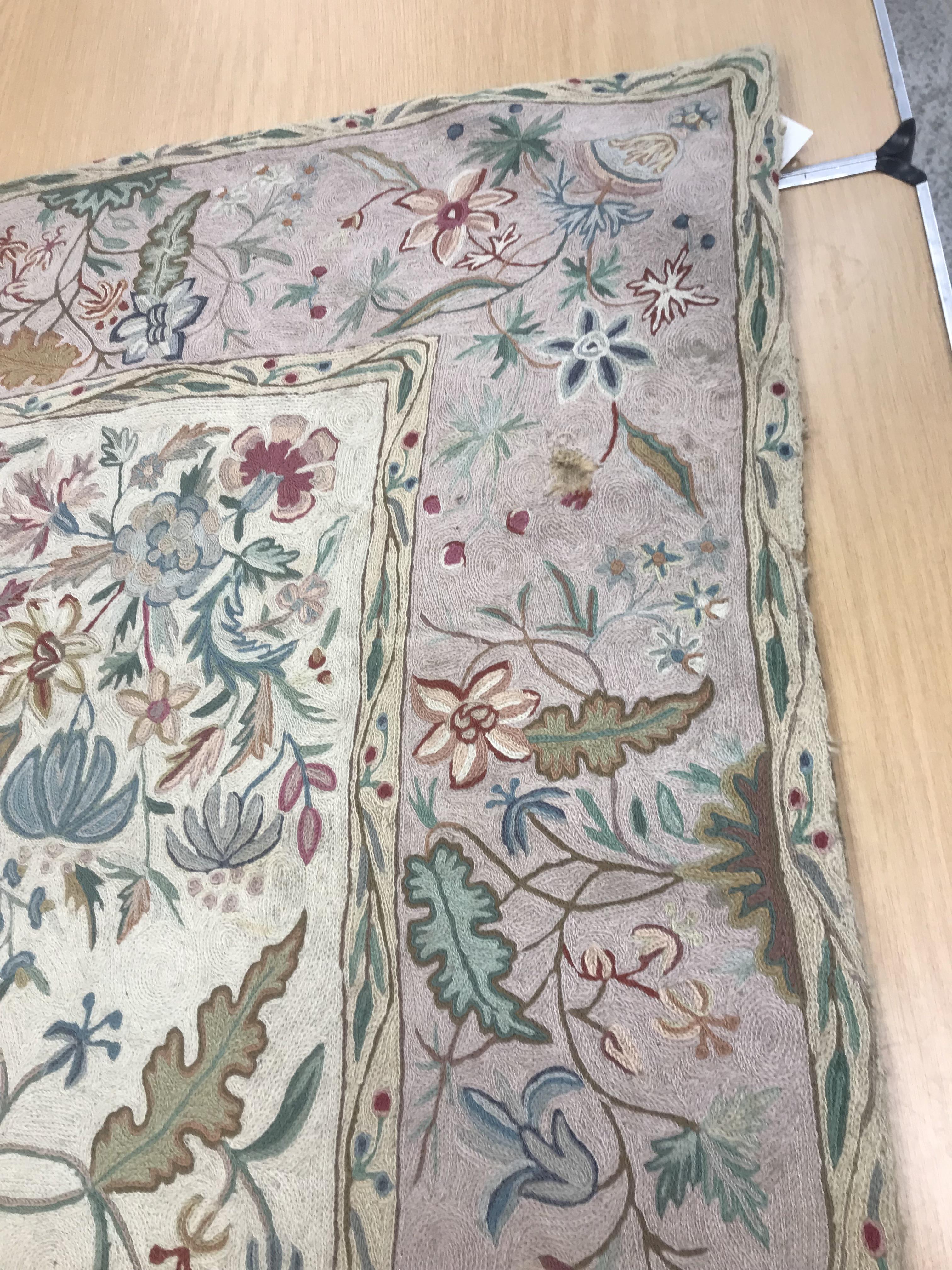 A pair of early 20th Century crewelwork panels with floral decoration on cream and pink grounds, - Image 4 of 21