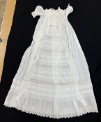 A circa 1900 Honiton type lace Christening gown with floral and foliate decoration and fine work to