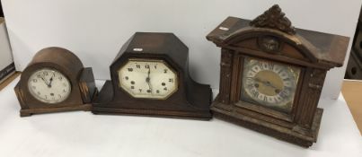 A 19th Century German walnut cased mantel clock with eight day movement and Roman numerals to the