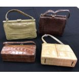 Four circa 1950s crocodile skin handbags