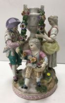 A 19th Century Meissen porcelain figure group depicting a man,