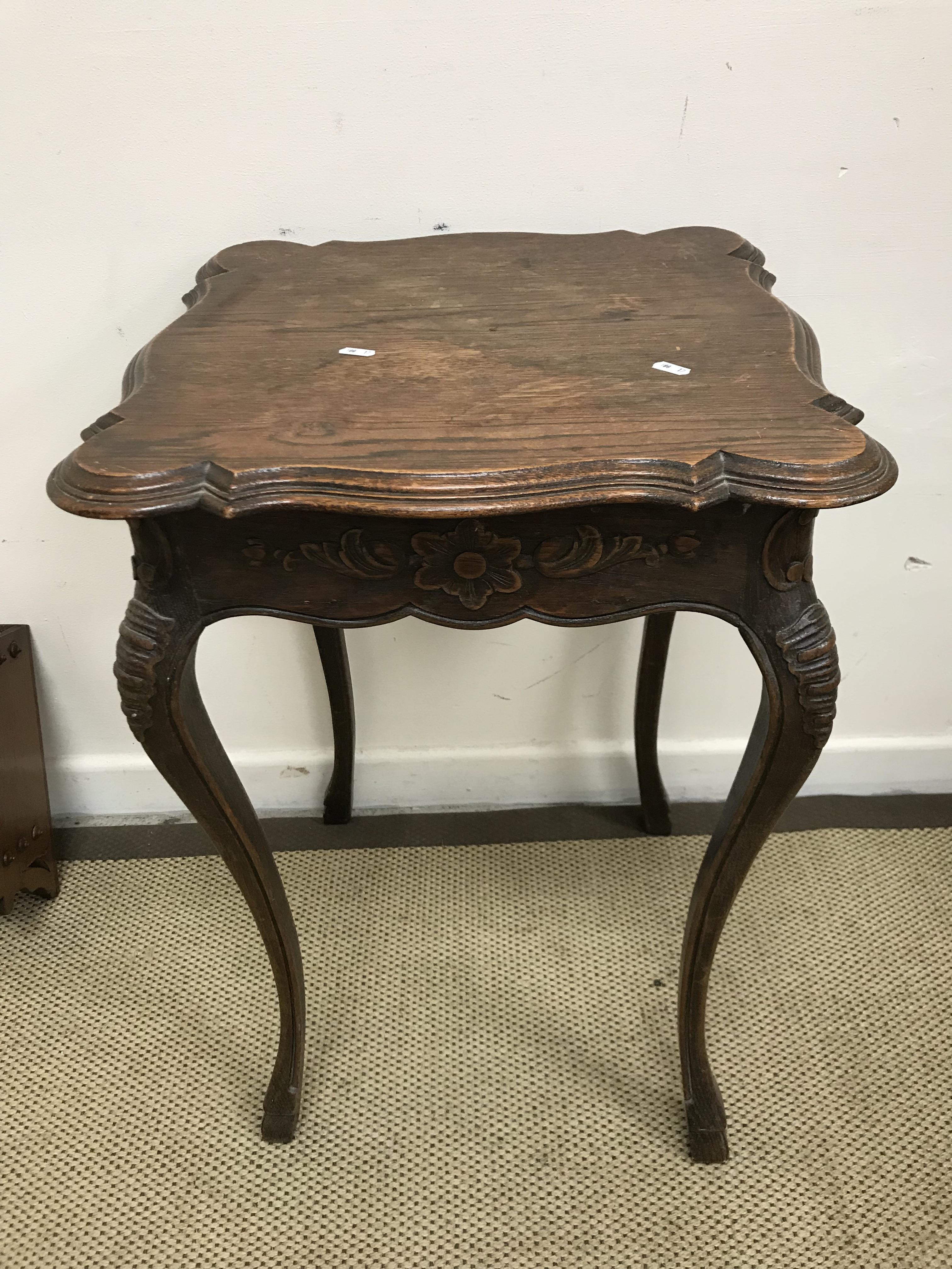 A late Victorian oak occasional table,