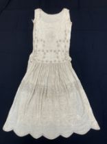 A 1920s silk and beaded flapper dress,