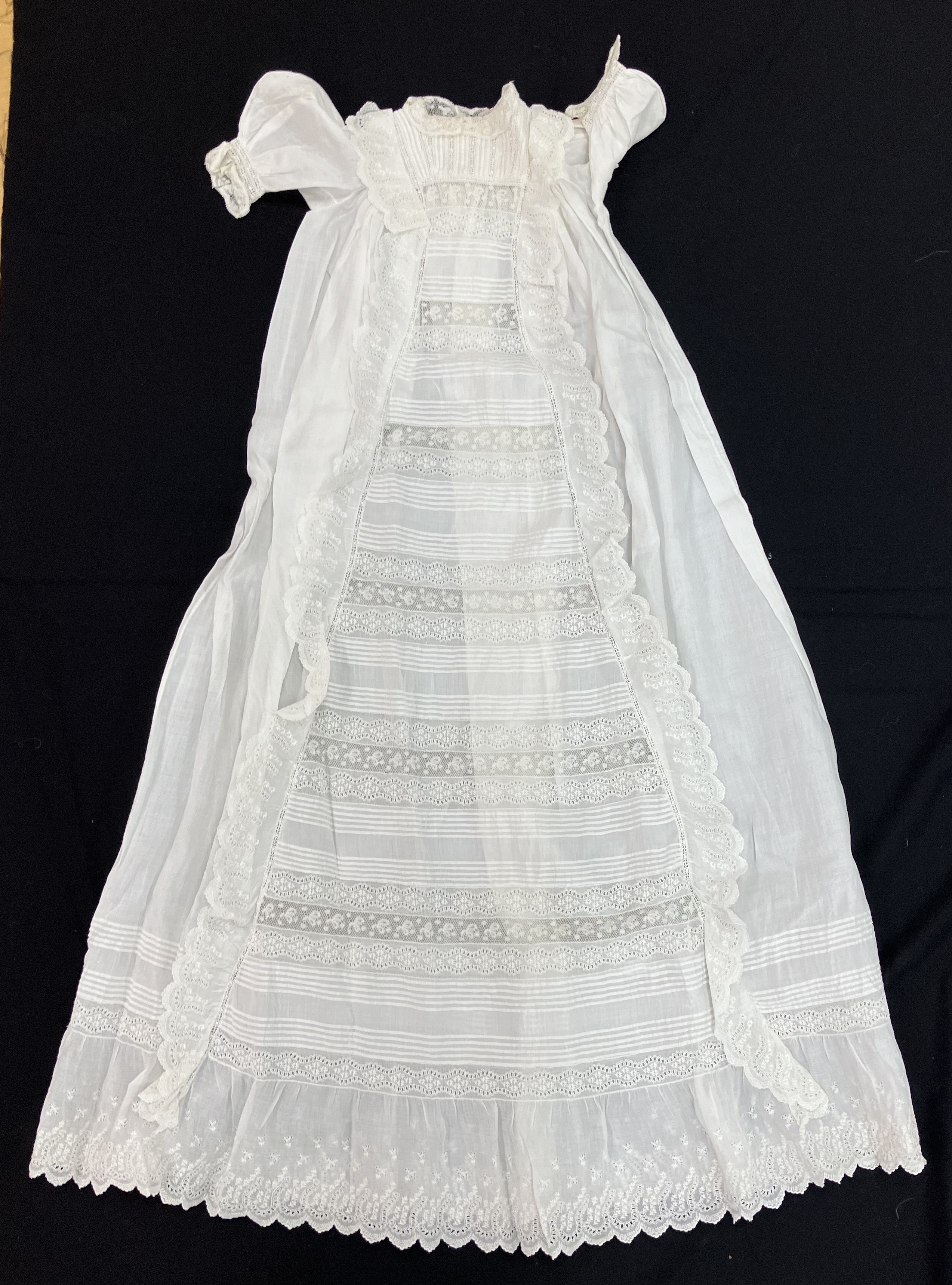 A circa 1900 Honiton type lace Christening gown with floral and foliate decoration and fine work to - Image 2 of 7