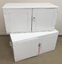 Two white painted chests (converted to cupboards) with two doors enclosing recesses,