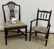 A circa 1900 child's stained beech framed rush seat spindle back elbow chair,