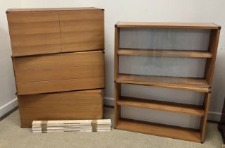 A Tapley SL teak suite of furniture comprising fall front bureau, three drawer chest,