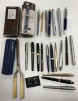A collection of various fountain and other pens to include two Parker Sonnets (and four other