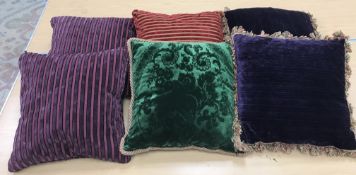 A box containing six various velvet and chenille scatter cushions