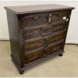 A 20th Century oak chest in the 17th Century manner,