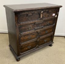 A 20th Century oak chest in the 17th Century manner,