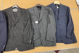 A collection of seven Brioni gentleman's suits each comprising jacket and trousers together with