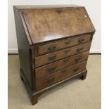 An 18th Century walnut bureau,