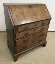 An 18th Century walnut bureau,