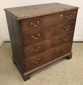An 18th Century oak square front chest,