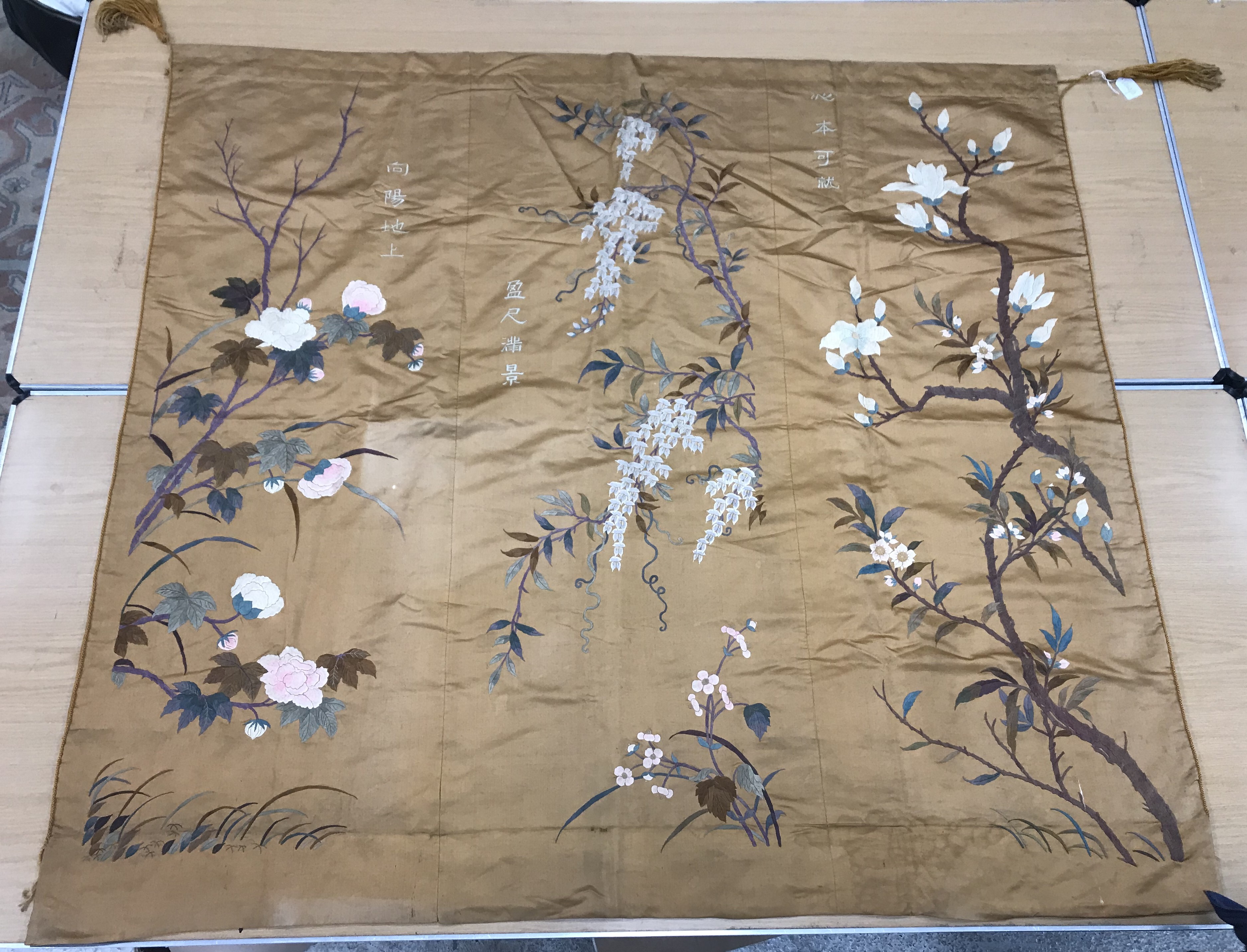 An early 20th Century silk panel set with embroidered floral decoration and Chinese character marks, - Image 2 of 8