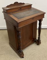 A late Victorian walnut Davenport desk of small proportions, 53 cm wide x 80 cm high,