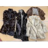 A box containing a quantity of fur coats to include three coats, stole etc some mink,