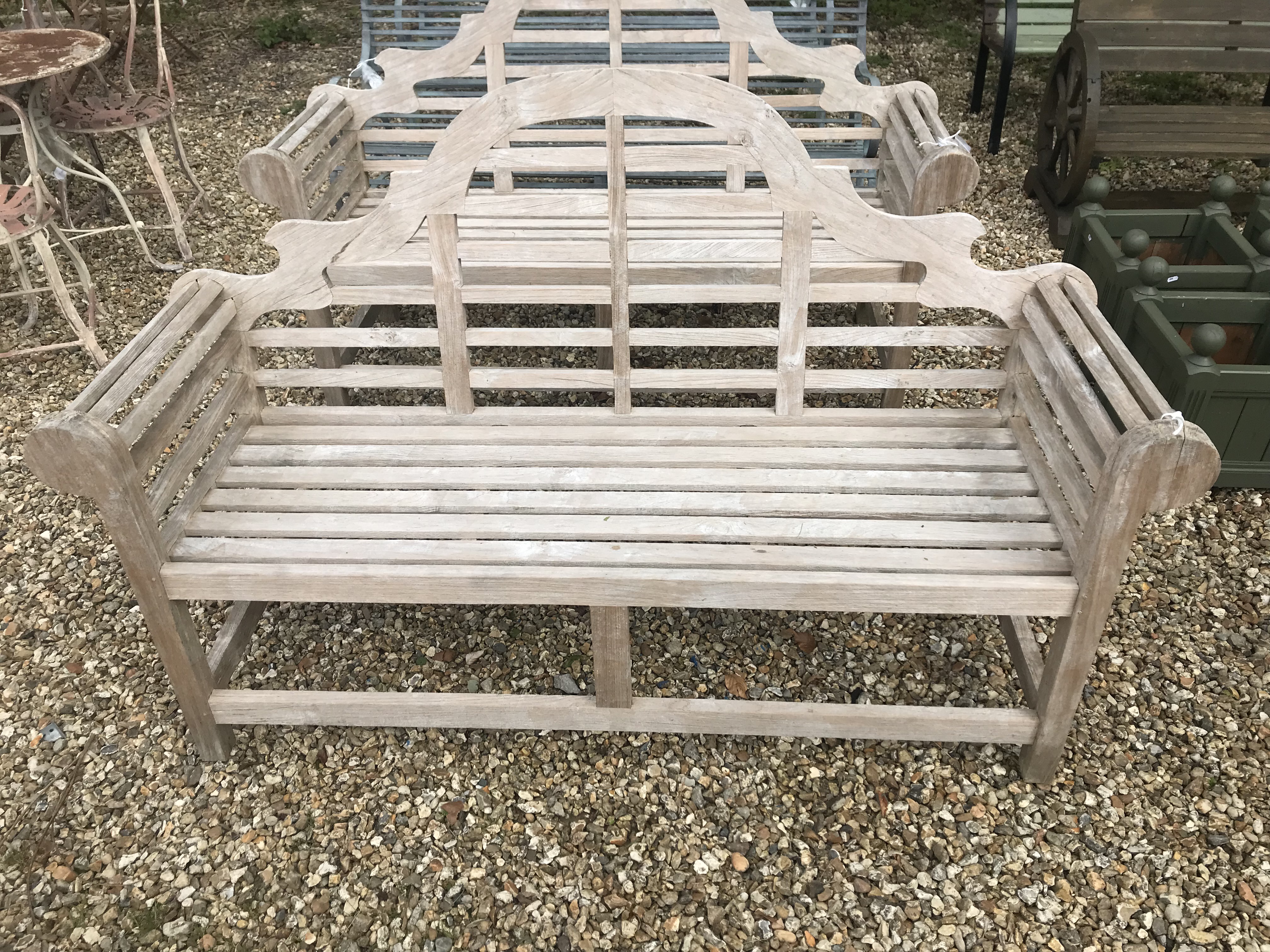 A slatted teak Lutyens design bench 166 cm wide