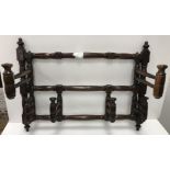 A rare 19th Century laburnum alpinum wall-mounted wig rack of six turned and ringed folding hooks,