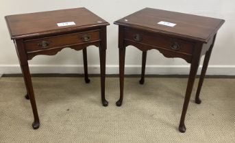 A pair of 20th Century mahogany lamp or side tables in the early Georgian style,