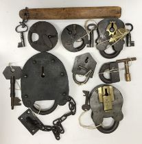 A collection of various 19th Century iron padlocks,