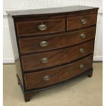 A circa 1900 mahogany bow fronted chest,