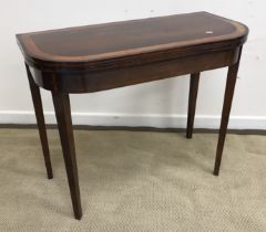 An early 19th Century rosewood fold-over card table,