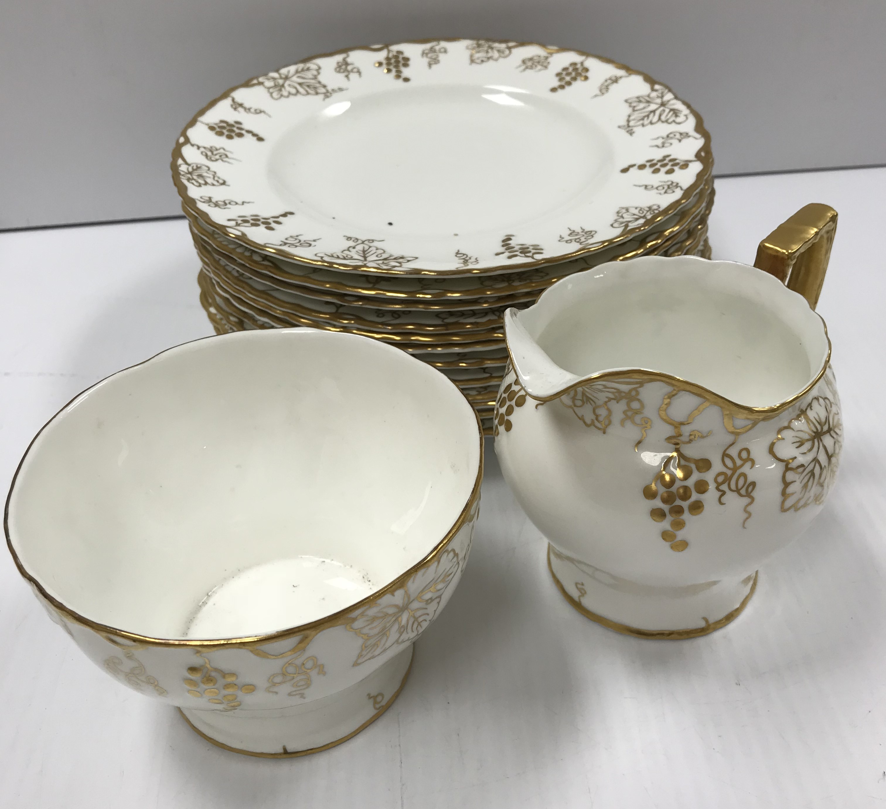 A Royal Crown Derby "Vine" pattern white glazed and gilt decorated tea set, - Image 4 of 5