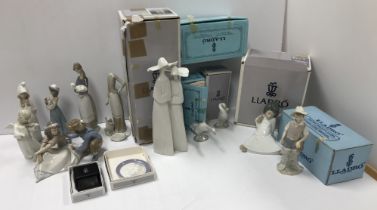 A large collection of Lladro figures to include "Nuns" (No. 4611), "Angel wondering" (No.
