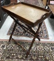 A Victorian mahogany butler's tray of rectangular form with side carrying handles,