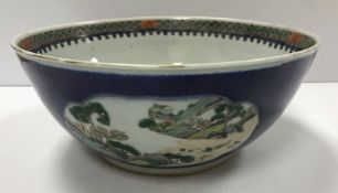 A 19th Century Chinese polychrome decorated fruit bowl with medallion decoration of exotic pheasant,