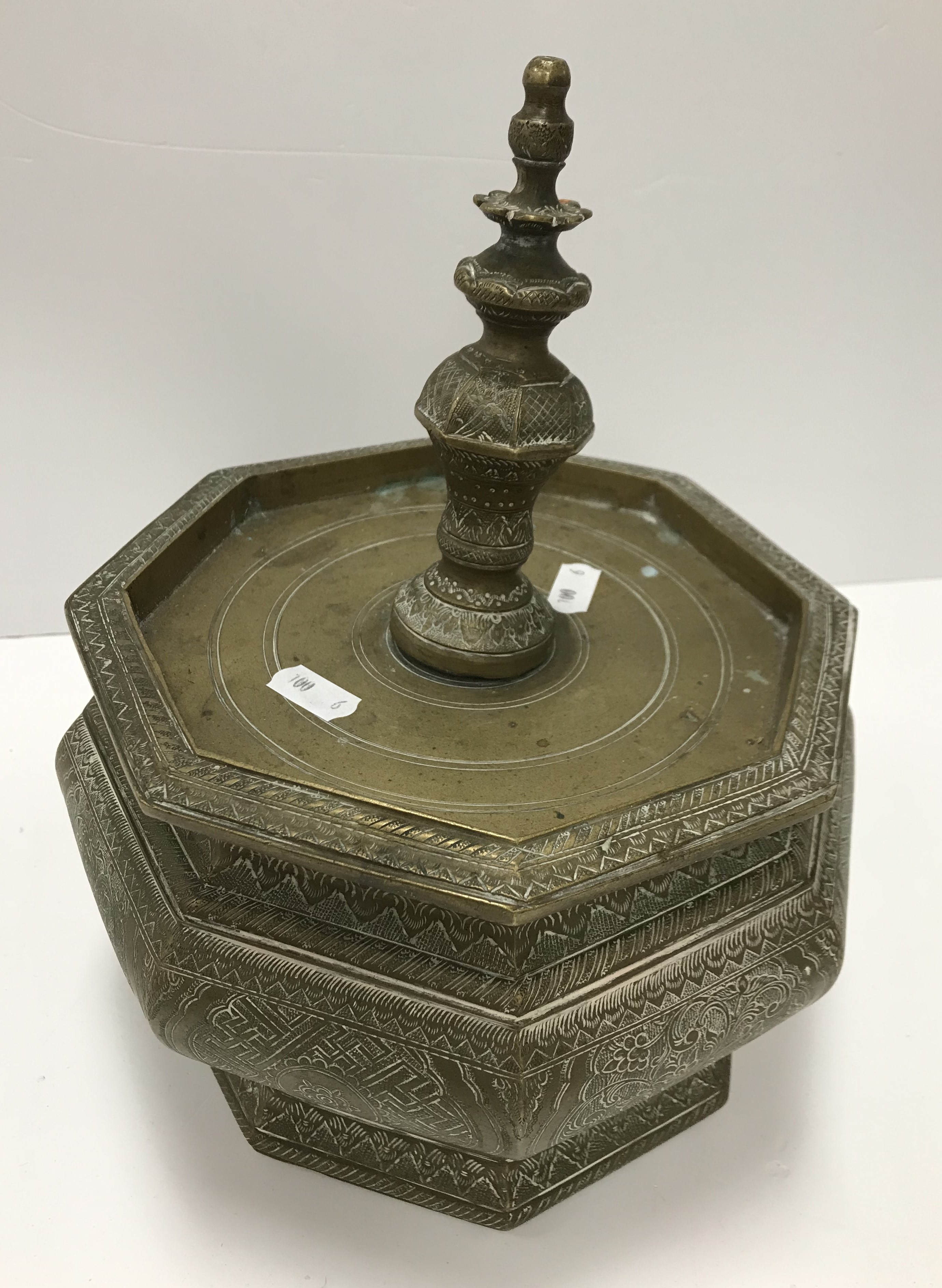 An Indonesian engraved brass betel jar and cover,