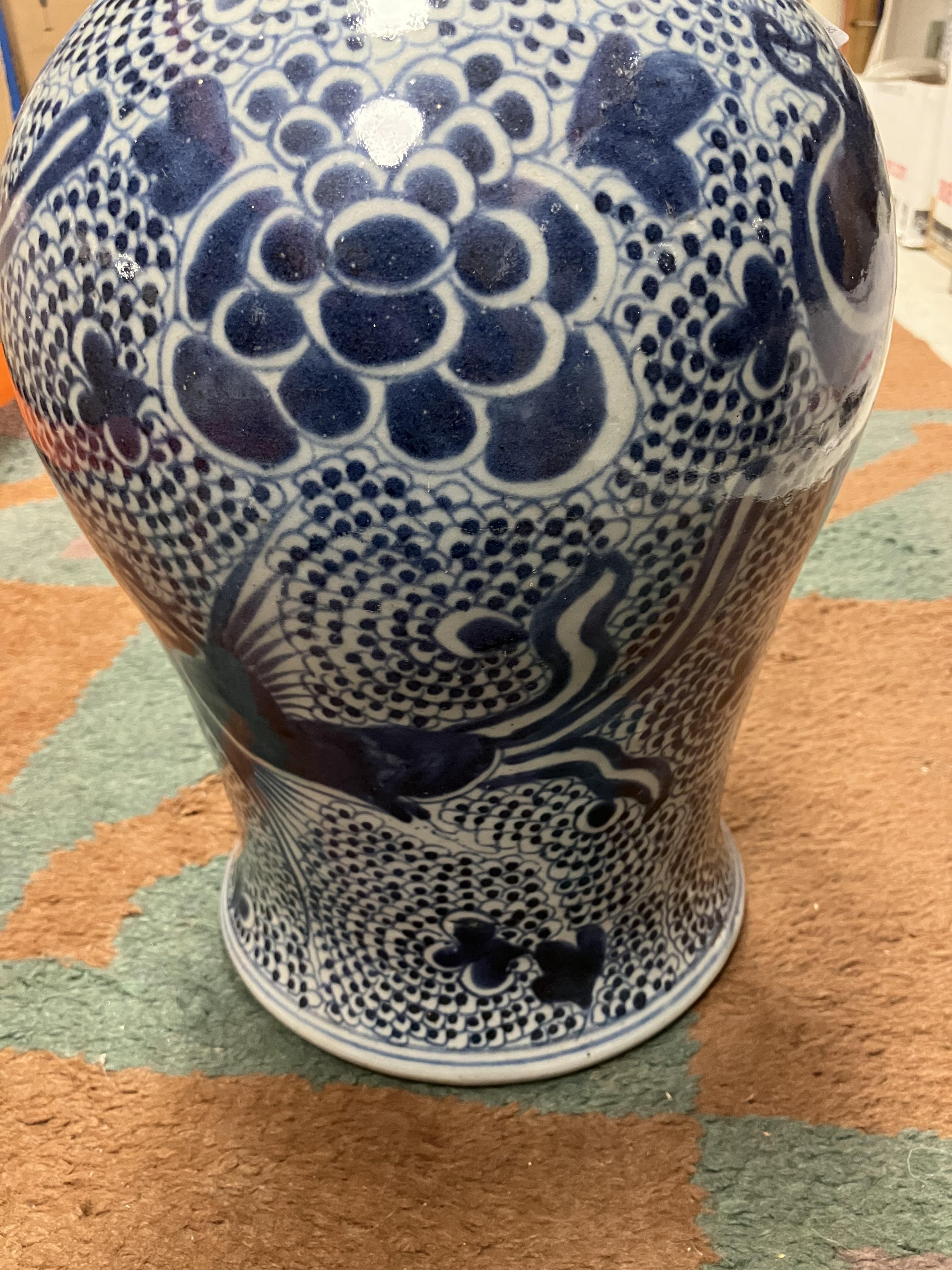An 18th Century Chinese blue and white baluster shaped vase and cover, - Image 20 of 43