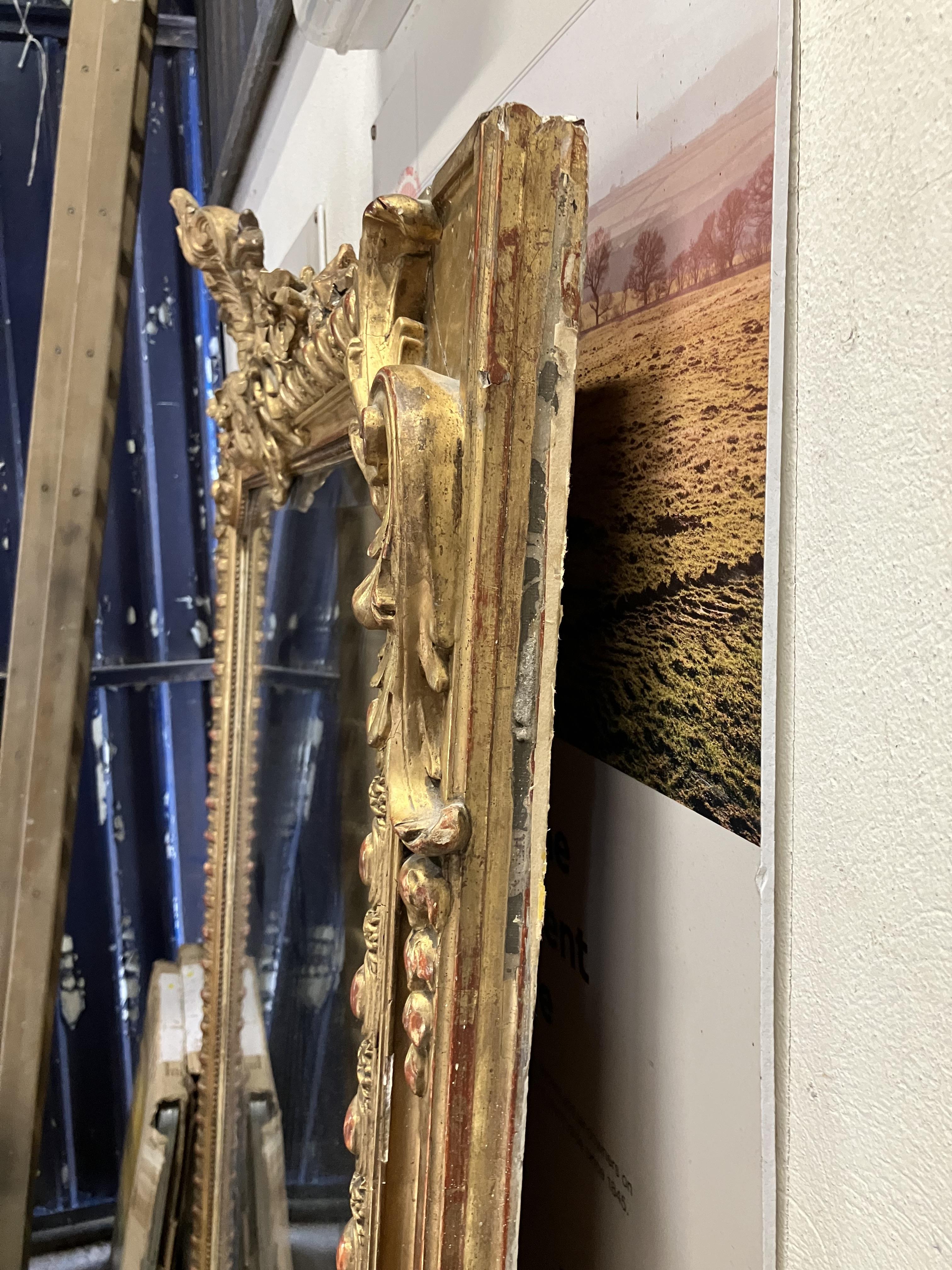 A Victorian carved giltwood and gesso framed over mantel mirror with shell and foliate carved - Image 16 of 50