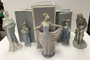 A collection of Lladro figures comprising "Dancer" (No. 05050), "Boy from Madrid" (No.