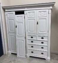 A Waring & Gillow painted wardrobe compactum,
