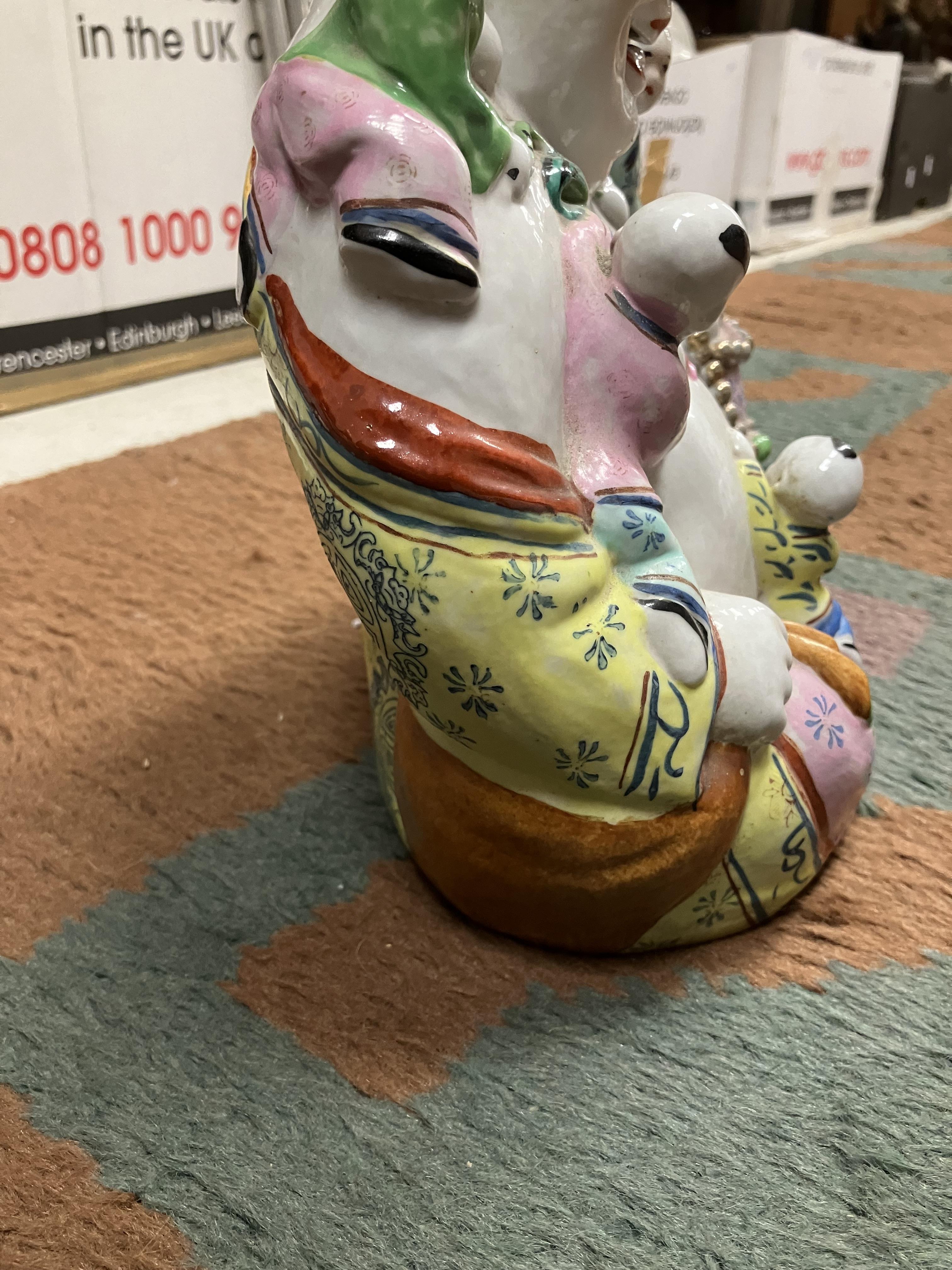 A Chinese polychrome decorated figure of a seated Buddha with five children bearing impressed four - Image 9 of 29