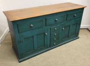 An oak and green painted dining room suite circa 1994, retailed by Heals,