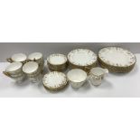 A Royal Crown Derby "Vine" pattern white glazed and gilt decorated tea set,