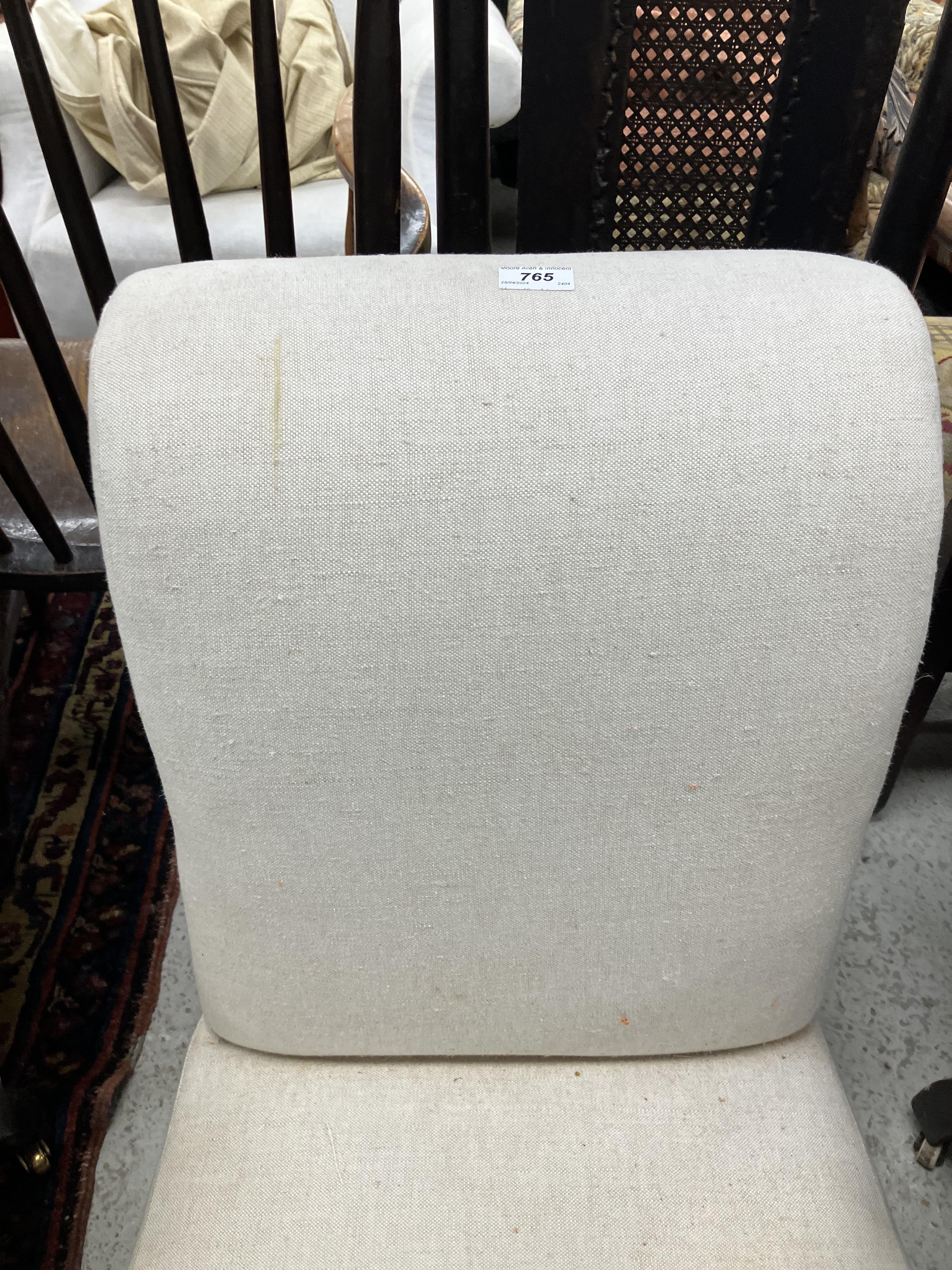 A Victorian upholstered scroll arm chair on ebonised turned front legs to later brass castors, - Image 11 of 52