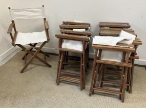 A set of ten folding director's type chairs and four Focus folding garden tables,
