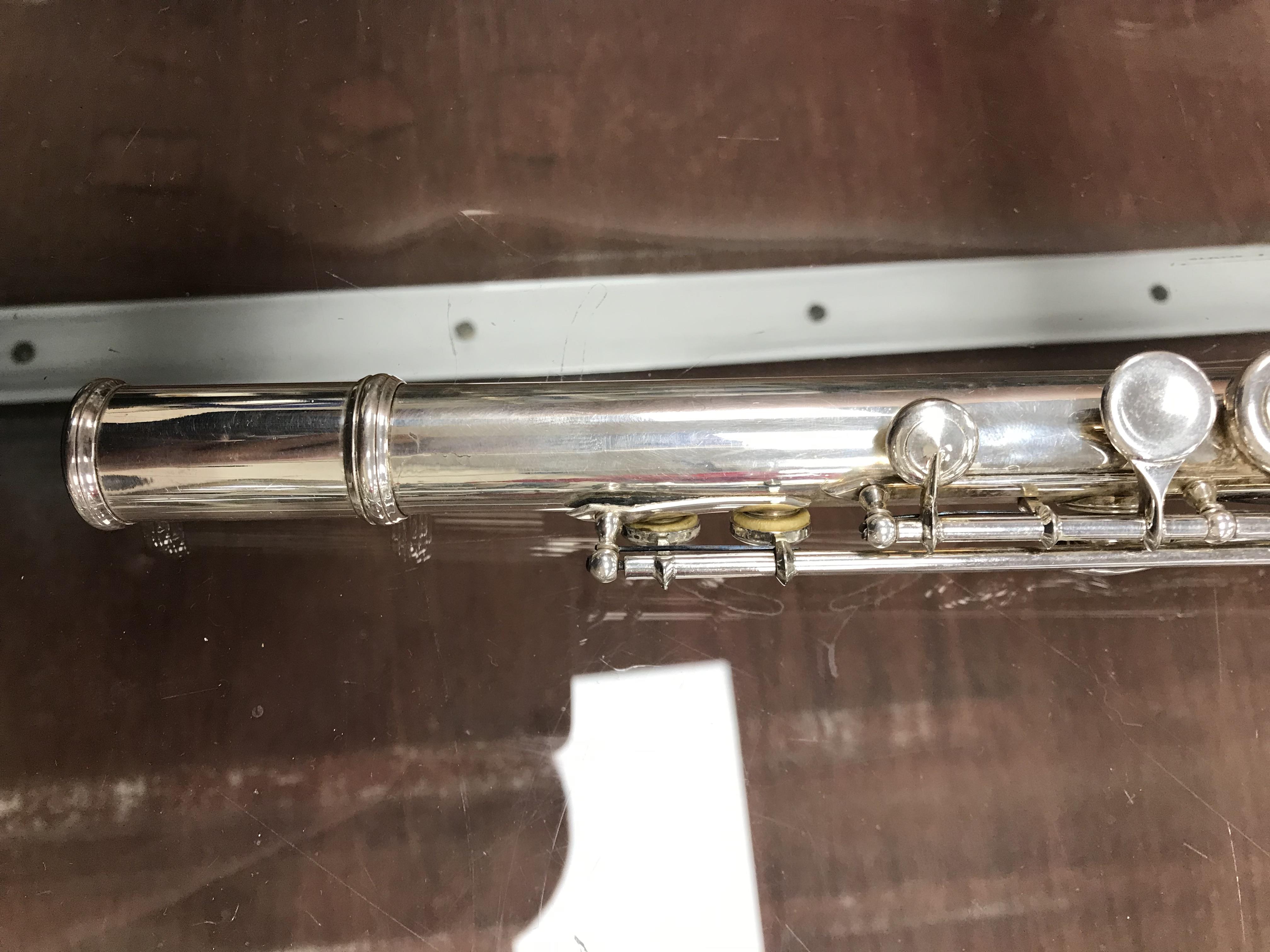 A circa 1947 silver plated flute by Clement Masson bearing engraved maker's mark and date 1947 - Image 9 of 17