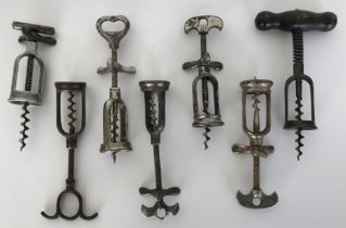 A collection of seven 19th and early 20th Century French steel corkscrews