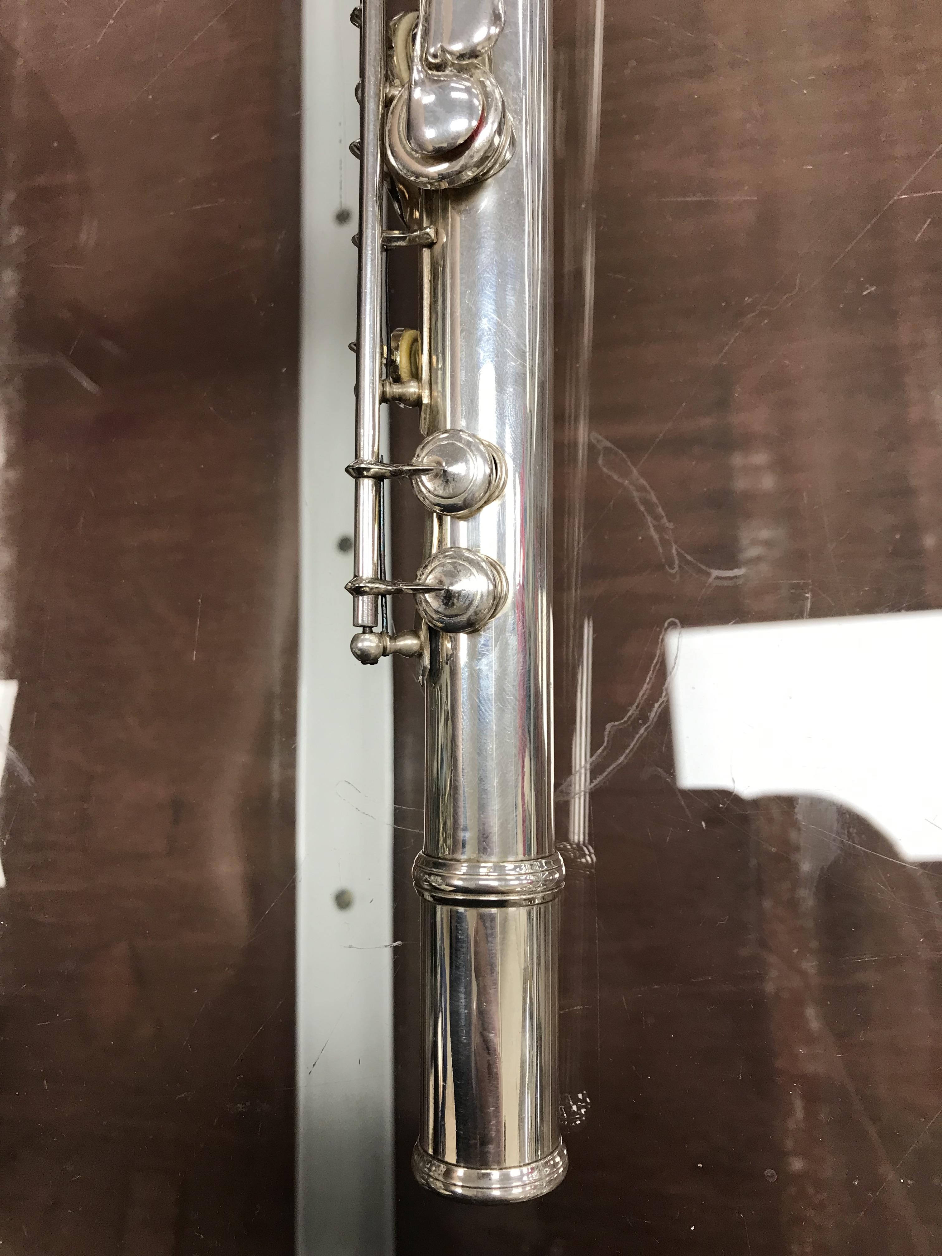 A circa 1947 silver plated flute by Clement Masson bearing engraved maker's mark and date 1947 - Image 5 of 17