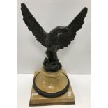 A 19th Century Grand Tour bronze spreadeagle figure on a sienna marble and bronze mounted socle